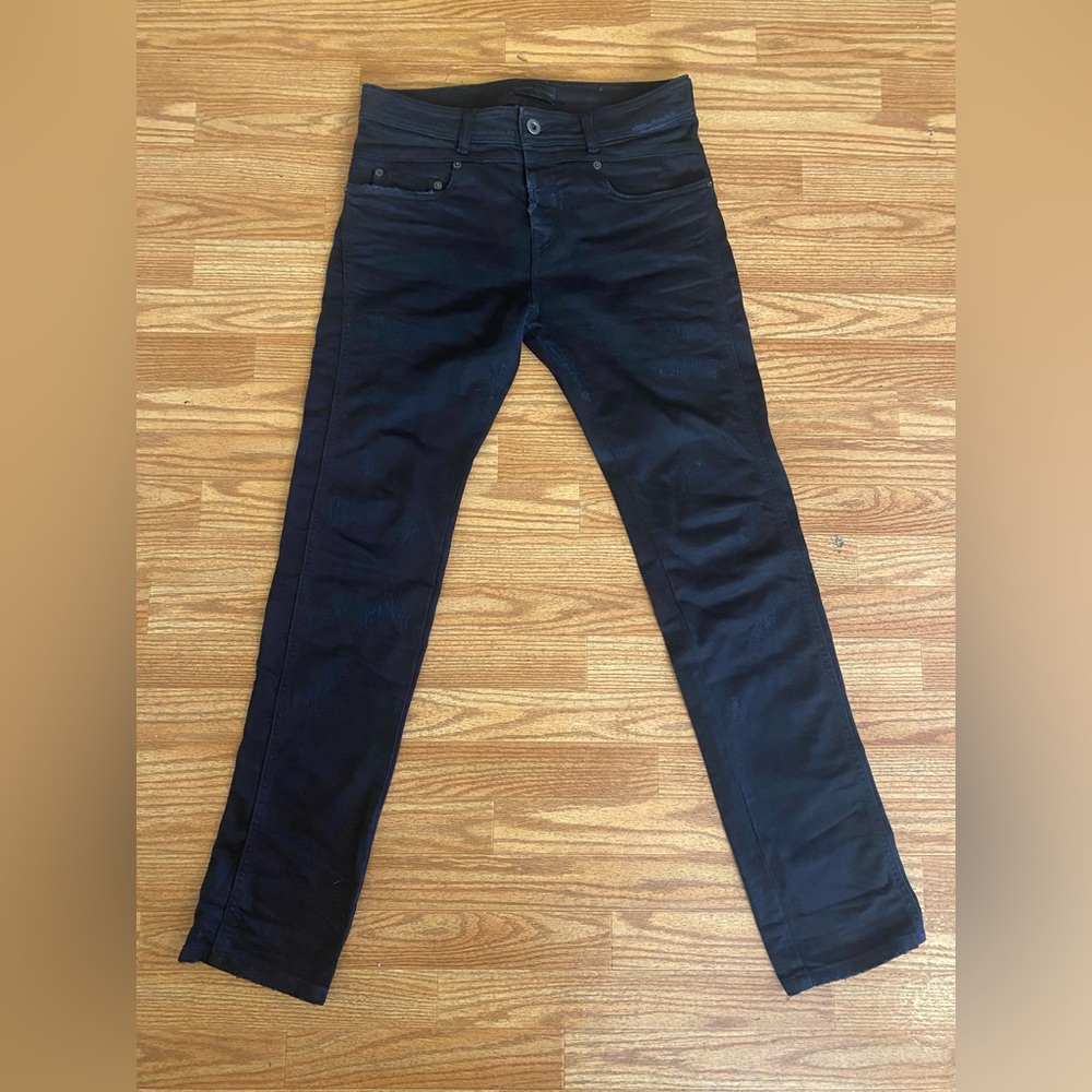 Diesel Black Gold Skinny Jeans in black.